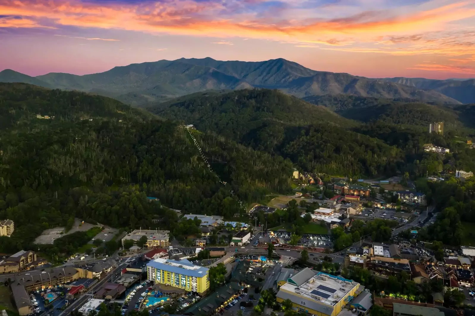 view of Smoky Mountains and Gatlinburg at sunset