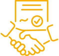 shaking hands in front of signed agreement