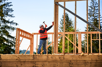 construction worker building cabin in smoky mountains
