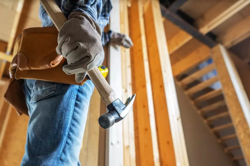 construction worker holding hammer