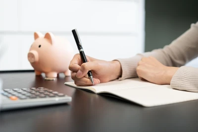 bookkeeping next to piggy bank