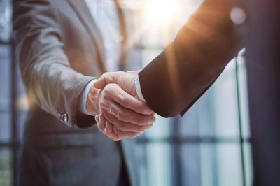 people shaking hands
